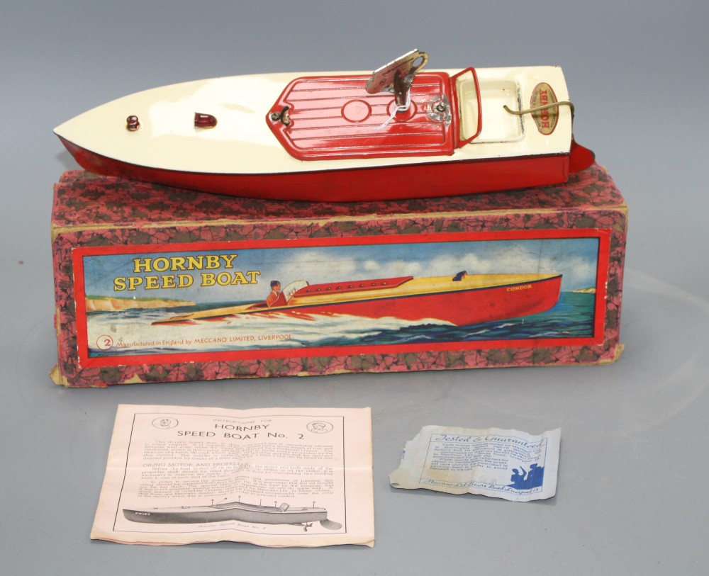 A Hornby tinplate clockwork No.2 Swift model speedboat, with red hull, boxed